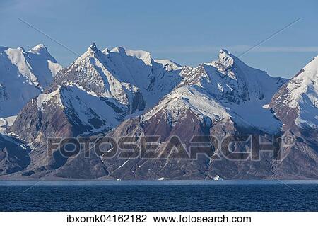 Verschneite Berge, Holmbugt, Kong Oscar Fjord, Nordost-Gronland-Nationalpark, Gronland, Nordamerika View Large Photo Image Stock Image - Verschneite Berge, Holmbugt, Kong Oscar Fjord, Nordost-Gronland-Nationalpark, Gronland, Nordamerika. Fotosearch