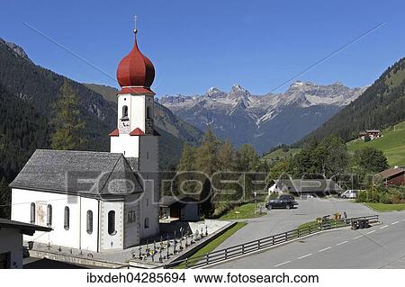 Wallfahrtskirche Maria Schnee mit Sicht auf die Tannheimer Berge, Bschlabs im Lechtal, Tirol, Osterreich, Europa View Large Photo Image Picture - Wallfahrtskirche Maria Schnee mit Sicht auf die Tannheimer Berge, Bschlabs im Lechtal, Tirol, Osterreich, Europa. Fotosearch