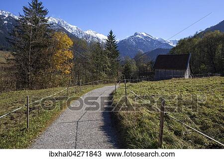 Wanderweg bei Hinterstein, hinten schneebedeckte Allgauer Berge, Herbststimmung, Allgau, Bayern, Deutschland, Europa View Large Photo Image Stock Image - Wanderweg bei Hinterstein, hinten schneebedeckte Allgauer Berge, Herbststimmung, Allgau, Bayern, Deutschland, Europa. Fotosearch