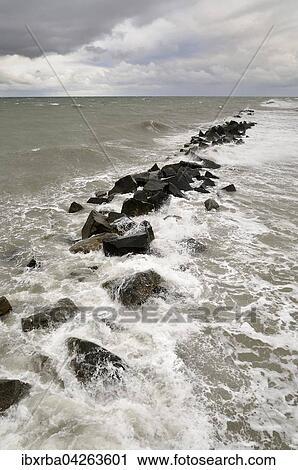Wellenbrecher am Strand von Wustrow bei sturmischer See, Mecklenburg-Vorpommern, Deutschland, Europa View Large Photo Image Stock Image - Wellenbrecher am Strand von Wustrow bei sturmischer See, Mecklenburg-Vorpommern, Deutschland, Europa. Fotosearch