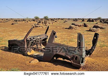 Wrack eines Gelandewagens in der Wuste, Strecke Atar nach Tidjikja, Region Adrar, Mauretanien, Afrika View Large Photo Image Stock Image - Wrack eines Gelandewagens in der Wuste, Strecke Atar nach Tidjikja, Region Adrar, Mauretanien, Afrika. Fotosearch