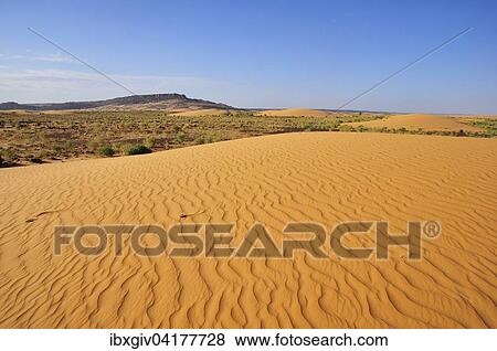 Wustenlandschaft mit Sanddune und felsigem Hugel, Strecke Atar nach Tidjikja, Region Adrar, Mauretanien, Afrika View Large Photo Image Stock Photo - Wustenlandschaft mit Sanddune und felsigem Hugel, Strecke Atar nach Tidjikja, Region Adrar, Mauretanien, Afrika. Fotosearch