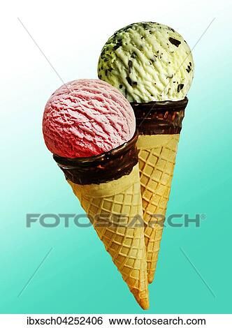 Stock Photograph - Zwei Eistuten mit Eiskugeln, Erdbeer und Pistazie. Fotosearch