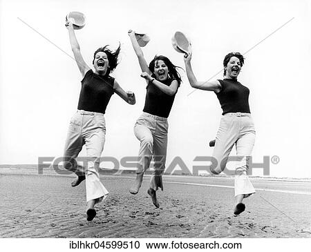 3 women on the beach, England, Great Britain View Large Photo Image Stock Image - 3 women on the beach, England, Great Britain. Fotosearch