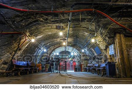 A few tourist waiting underground for the elevator, Bochnia salt mine, Poland, Europe View Large Photo Image Stock Image - A few tourist waiting underground for the elevator, Bochnia salt mine, Poland, Europe. Fotosearch