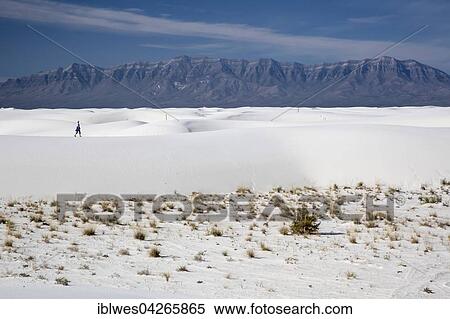 A woman hiking in White Sands National Monument, Alamogordo, New Mexico, United States, North America View Large Photo Image Stock Photography - A woman hiking in White Sands National Monument, Alamogordo, New Mexico, United States, North America. Fotosearch