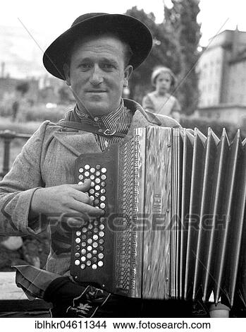 Accordionist, Freiburg and surroundings ca. 1955, Freiburg, Germany, Europe View Large Photo Image Picture - Accordionist, Freiburg and surroundings ca. 1955, Freiburg, Germany, Europe. Fotosearch