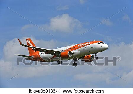 Airbus A320-214 of the airline easyJet on approach to Geneva, Switzerland, Europe View Large Photo Image Stock Image - Airbus A320-214 of the airline easyJet on approach to Geneva, Switzerland, Europe. Fotosearch