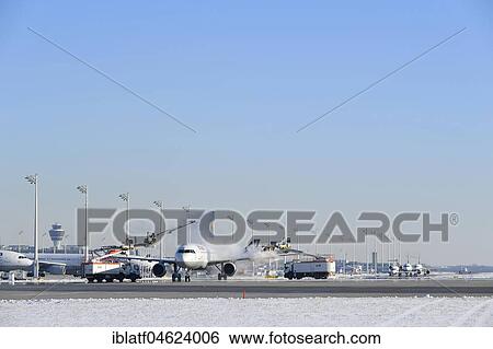 Stock Photograph - Aircraft de-icing, Lufthansa, Airbus A 321, Munich Airport, Upper Bavaria, Germany, Europe. Fotosearch