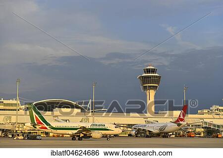 Stock Photograph - Alitalia, Airbus A318, in front of Terminal 1, Munich Airport, Germany, Europe. Fotosearch