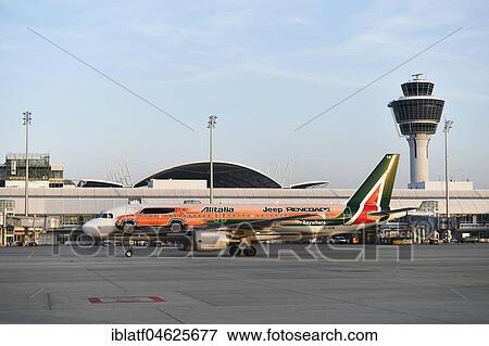 Alitalia, Airbus, A320, special version Jeep Renegade, with tower in front of Terminal 1, Munich Airport, Upper Bavaria, Germany, Europe View Large Photo Image Stock Photo - Alitalia, Airbus, A320, special version Jeep Renegade, with tower in front of Terminal 1, Munich Airport, Upper Bavaria, Germany, Europe. Fotosearch