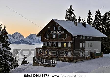Alpine guest house Loas in a winter landscape at dusk, Schwaz, Tyrol, Austria, Europe View Large Photo Image Stock Image - Alpine guest house Loas in a winter landscape at dusk, Schwaz, Tyrol, Austria, Europe. Fotosearch