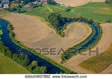 Altarm der Lippe between mown fields, half heart, Lippeaue, nature reserve, Waltrop, Ruhr Area, North Rhine-Westphalia, Germany, Europe View Large Photo Image Stock Image - Altarm der Lippe between mown fields, half heart, Lippeaue, nature reserve, Waltrop, Ruhr Area, North Rhine-Westphalia, Germany, Europe. Fotosearch