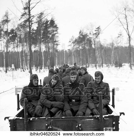 Picture - Approx. 1939, 1941, training Wehrmacht, soldiers drive in a car without roof, Ulm, Germany, Europe. Fotosearch