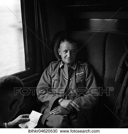 Stock Image - Approx. 1939, 1941, training Wehrmacht, soldier in the train compartment, Ulm, Germany, Europe. Fotosearch