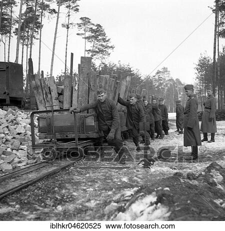 Approx. 1939, 1941, training Wehrmacht, soldiers transport wood with wagons on tracks in winter, Ulm, Germany, Europe View Large Photo Image Stock Photography - Approx. 1939, 1941, training Wehrmacht, soldiers transport wood with wagons on tracks in winter, Ulm, Germany, Europe. Fotosearch