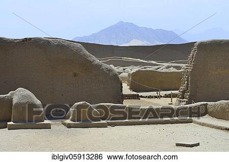 Stock Photograph - Artistic walls made of mud brick, adobe, ruins of Chan Chan, Trujillo, La Liberdad region, Peru, South America. Fotosearch