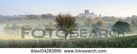Autumn landscape, castle hill with collegiate church of St. Servatius, fog, UNESCO, in Quedlinburg, Saxony-Anhalt, Germany, Europe View Large Photo Image Stock Image - Autumn landscape, castle hill with collegiate church of St. Servatius, fog, UNESCO, in Quedlinburg, Saxony-Anhalt, Germany, Europe. Fotosearch
