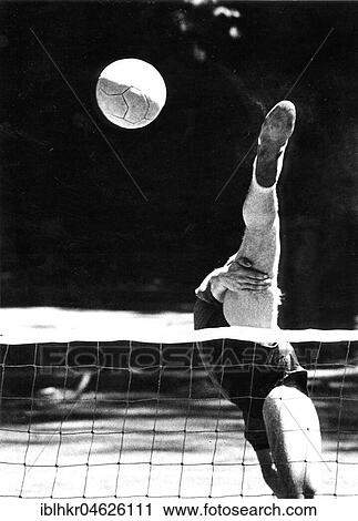 Balancing act at volleyball ca. 1970s, exact place unknown, Czech Republic, Europe View Large Photo Image Stock Image - Balancing act at volleyball ca. 1970s, exact place unknown, Czech Republic, Europe. Fotosearch