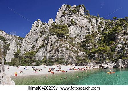 Stock Photo - Bathers, Les Calanques d'en Vau, Calanques National Park or Parc National des Calanques, Cassis, Provence, Provence-Alpes-Cote d'Azur, Southern France, France, Europe. Fotosearch