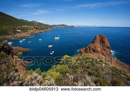 Stock Image - Bay with pleasure boats, Massif de l' Esterel, Esterel Mountains, Département Var, Region Provence-Alpes-Côte d' Azur, France, Europe. Fotosearch
