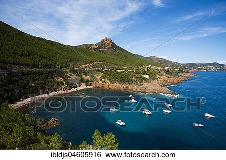 Stock Photograph - Bay with pleasure boats, Massif de l' Esterel, Esterel Mountains, Département Var, Region Provence-Alpes-Côte d' Azur, France, Europe. Fotosearch