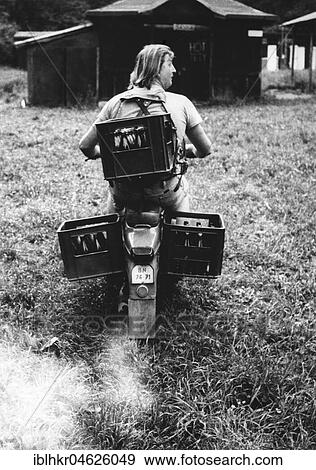 Beer crates transported by moped ca. 1970s, exact place unknown, Czech Republic, Europe View Large Photo Image Stock Photo - Beer crates transported by moped ca. 1970s, exact place unknown, Czech Republic, Europe. Fotosearch