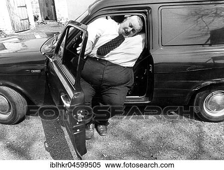 Big man in the car, England, Great Britain View Large Photo Image Stock Photography - Big man in the car, England, Great Britain. Fotosearch