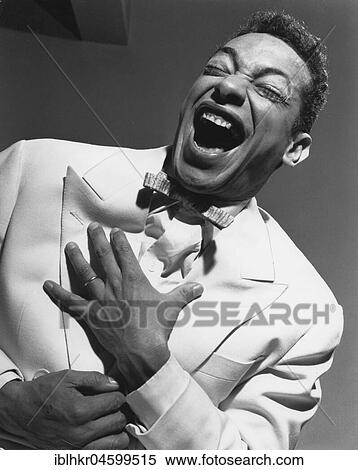 Stock Photography - Black laughs, England, Great Britain. Fotosearch