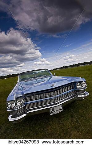 Blue 1964 Cadillac Deville, Power Meet oldtimer meeting, altered license plate, Vasteras, Sweden, Europe View Large Photo Image Stock Photo - Blue 1964 Cadillac Deville, Power Meet oldtimer meeting, altered license plate, Vasteras, Sweden, Europe. Fotosearch