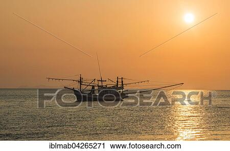 Boat in the sea at sunset, Koh Samui, Gulf of Thailand, Thailand, Asia View Large Photo Image Stock Image - Boat in the sea at sunset, Koh Samui, Gulf of Thailand, Thailand, Asia. Fotosearch