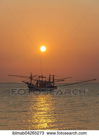 Boat in the sea at sunset, Koh Samui, Gulf of Thailand, Thailand, Asia View Large Photo Image Stock Image - Boat in the sea at sunset, Koh Samui, Gulf of Thailand, Thailand, Asia. Fotosearch
