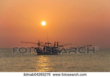 Boat in the sea at sunset, Koh Samui, Gulf of Thailand, Thailand, Asia View Large Photo Image Stock Photograph - Boat in the sea at sunset, Koh Samui, Gulf of Thailand, Thailand, Asia. Fotosearch