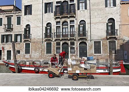 Boat with packages on a channel, mail boat offloading, Venetian parcel post, Rio San Banaba, Dorsoduro, Venice, Veneto, Italy, Europe View Large Photo Image Stock Image - Boat with packages on a channel, mail boat offloading, Venetian parcel post, Rio San Banaba, Dorsoduro, Venice, Veneto, Italy, Europe. Fotosearch