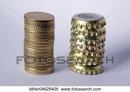 Stock Photography - Bottle deposit, coins and crown corks. Fotosearch