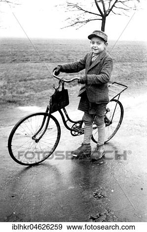 Stock Photo - Boy with bicycle, ca. 1955, Leipzig, Germany, Europe. Fotosearch