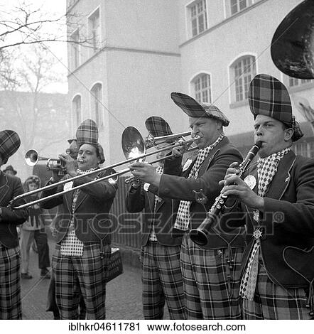 Brass band in uniform clothes, carnival, around 1950, Freiburg, Germany, Europe View Large Photo Image Stock Image - Brass band in uniform clothes, carnival, around 1950, Freiburg, Germany, Europe. Fotosearch