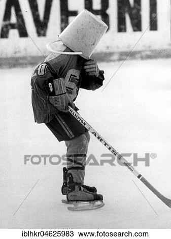 Stock Image - Bucket on hockey player ca. 1970s, exact place unknown, Czech Republic, Europe. Fotosearch