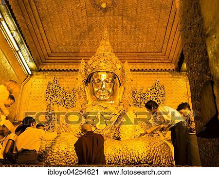 Buddha covered with small gold leaves, Mahamuni Paya, Chanmyathazi, Mandalay, Myanmar, Asia View Large Photo Image Stock Image - Buddha covered with small gold leaves, Mahamuni Paya, Chanmyathazi, Mandalay, Myanmar, Asia. Fotosearch
