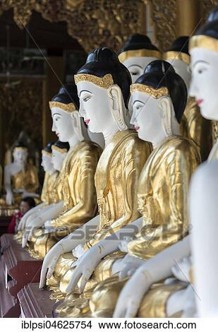 Buddha statues at Koo Chein Kan and Ma Kyee Kyee Hall, Shwedagon Pagoda, Yangon, Rangoon, Myanmar, Burma, Asia View Large Photo Image Picture - Buddha statues at Koo Chein Kan and Ma Kyee Kyee Hall, Shwedagon Pagoda, Yangon, Rangoon, Myanmar, Burma, Asia. Fotosearch