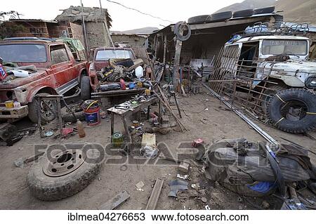 Car workshop in the Andes, Colquechaca in Potosi, Bolivia, South America View Large Photo Image Stock Image - Car workshop in the Andes, Colquechaca in Potosi, Bolivia, South America. Fotosearch