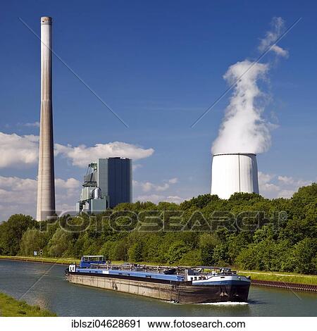 Cargo ship on the Datteln-Hamm Canal in front of the Bergkamen power station, Bergkamen, Ruhr Area, North Rhine-Westphalia, Germany, Europe View Large Photo Image Stock Image - Cargo ship on the Datteln-Hamm Canal in front of the Bergkamen power station, Bergkamen, Ruhr Area, North Rhine-Westphalia, Germany, Europe. Fotosearch