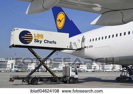 Catering handling by LSG Sky Chefs, Lufthansa Airbus A350-900, rear of Terminal 2, Munich Airport, Upper Bavaria, Germany, Europe View Large Photo Image Stock Photo - Catering handling by LSG Sky Chefs, Lufthansa Airbus A350-900, rear of Terminal 2, Munich Airport, Upper Bavaria, Germany, Europe. Fotosearch