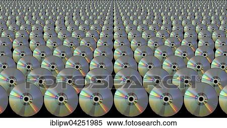 Stock Photography - CDs lined up in rows, compact discs. Fotosearch