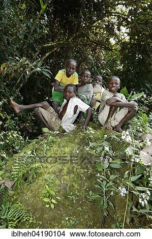 Children, boys sitting in the jungle, Matamba-Solo, Bandundu Province, Congo-Brazzaville, Africa View Large Photo Image Picture - Children, boys sitting in the jungle, Matamba-Solo, Bandundu Province, Congo-Brazzaville, Africa. Fotosearch