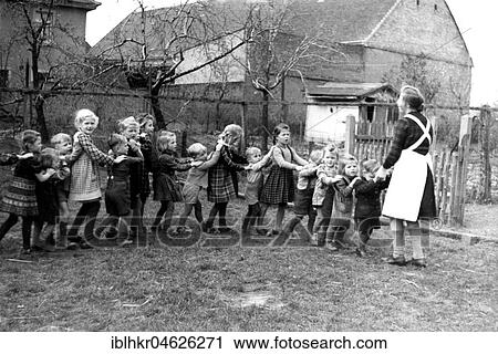 Children dance polonnaise, ca. 1955, Leipzig, Germany, Europe View Large Photo Image Stock Image - Children dance polonnaise, ca. 1955, Leipzig, Germany, Europe. Fotosearch