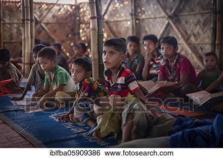 Children in a madrasah, Koran school, camp for Rohingya refugees from Myanmar, Kutupalong, Cox Bazar, Bangladesh, Asia View Large Photo Image Stock Photograph - Children in a madrasah, Koran school, camp for Rohingya refugees from Myanmar, Kutupalong, Cox Bazar, Bangladesh, Asia. Fotosearch