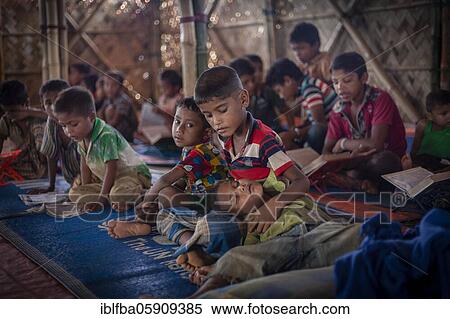 Children in a madrasah, Koran school, camp for Rohingya refugees from Myanmar, Kutupalong, Cox Bazar, Bangladesh, Asia View Large Photo Image Stock Photography - Children in a madrasah, Koran school, camp for Rohingya refugees from Myanmar, Kutupalong, Cox Bazar, Bangladesh, Asia. Fotosearch