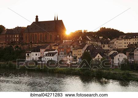 Church of St. Laurentius at sunset, Saarburg, Rhineland-Palatinate, Germany, Europe View Large Photo Image Stock Image - Church of St. Laurentius at sunset, Saarburg, Rhineland-Palatinate, Germany, Europe. Fotosearch