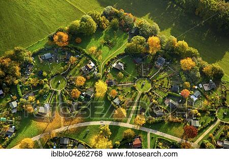 Circular allotment gardens, allotments on Heuweg, circular divisions, autumn, Witten-Stockum, Witten, Ruhr district, North Rhine-Westphalia, Germany, Europe View Large Photo Image Stock Photo - Circular allotment gardens, allotments on Heuweg, circular divisions, autumn, Witten-Stockum, Witten, Ruhr district, North Rhine-Westphalia, Germany, Europe. Fotosearch